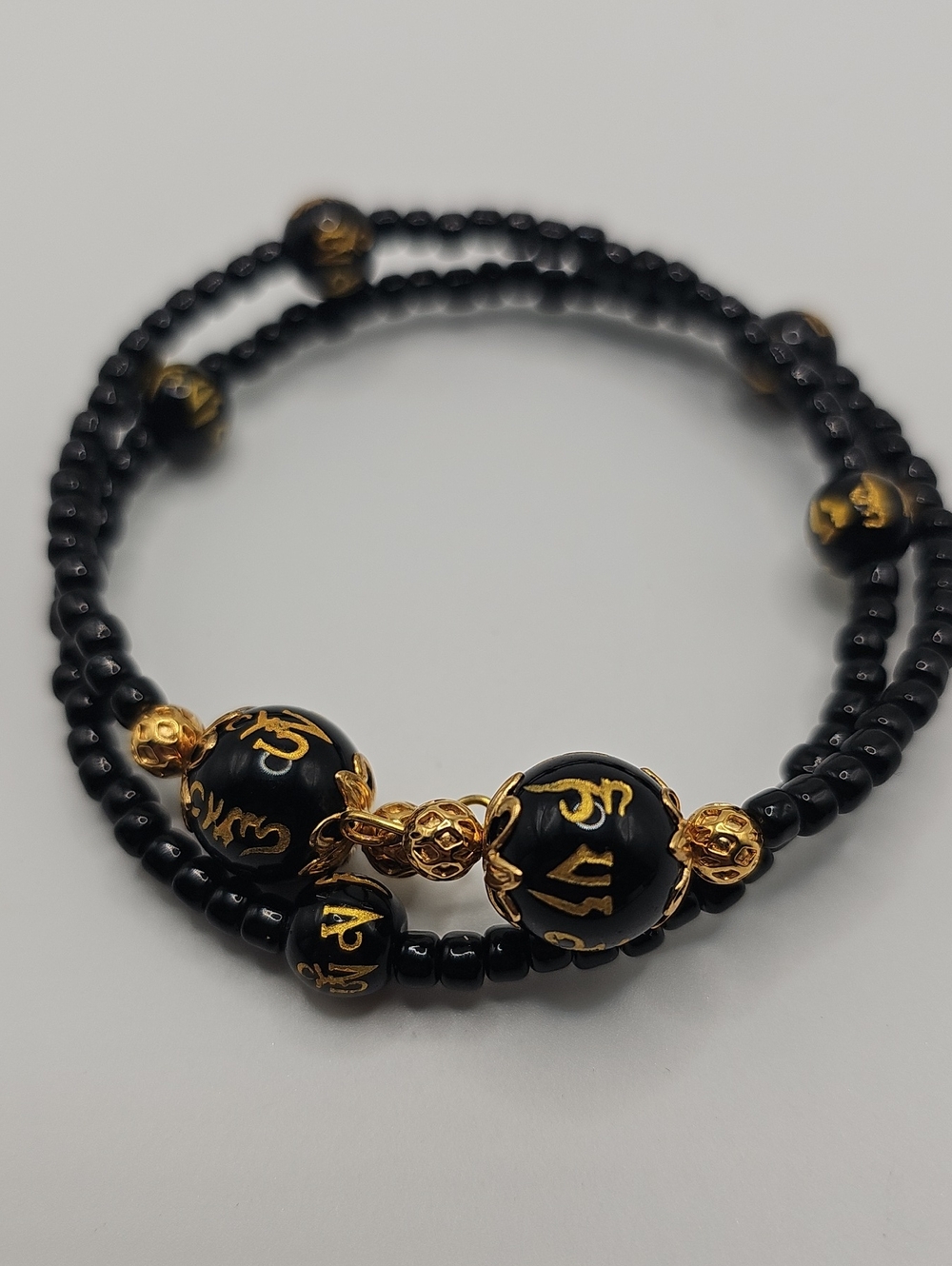 Black and Gold Beaded Wrap Bracelet - Elegant Women's Jewelry Buddhist Syllables